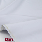 White premium plus fabric with gold text, soft texture for clothing or bedding