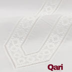 White embroidered table runner with geometric lace patterns, elegant home decor accent